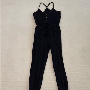 Black Sleeveless Jumpsuit with Front Button Detail